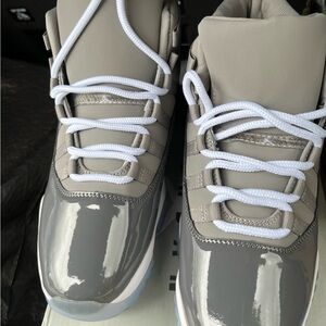 Brand new sneakers never worn size 10 Air Jordan 11 retro cool gray.